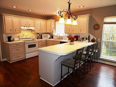 Kitchen View 1. View of breakfast bar/eating area;