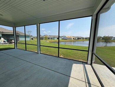 Unfurnished sunroom with a water view