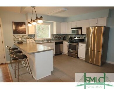 Kitchen. In addition to the spacious countertops a