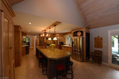 Island is perfect for prepping meals, also homework, art projects....room for just about anything!