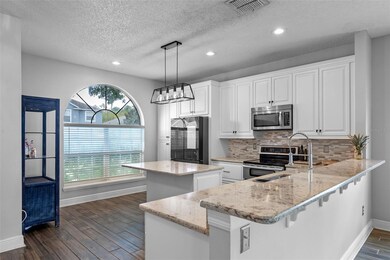 4784 Waterside Pointe Cir, Orlando, FL 32829 - photo 5