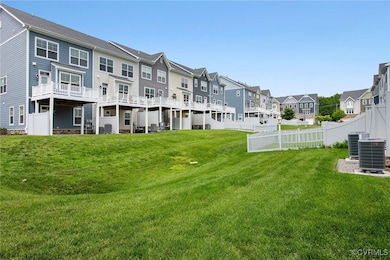 View of yard featuring a residential view and cool