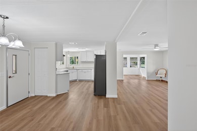 Dining Room looking into Kitchen, Living Room and Florida Room