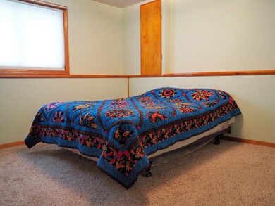 Bigger of two lower level bedrooms
