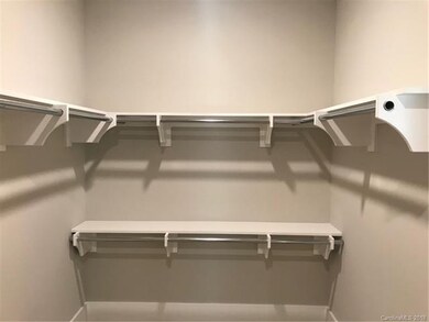 Site built wooden shelving in closetsThis image fr