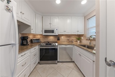 Riviera Golf Estates unit A104, Naples, FL 34112 - photo 3