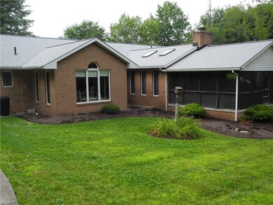 Screened in back porch area.