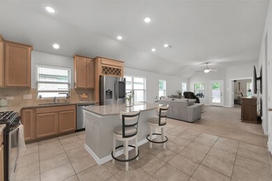 Never miss a moment with the open-concept layout,