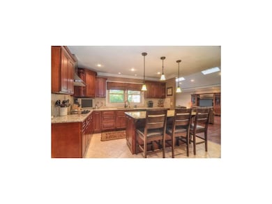 Incredible kitchen offers tile floor, HUGE granite