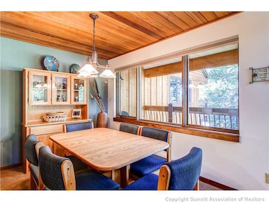 Dining Room. deck on main level spans the length o