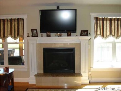 Living Room GAS FIREPLACE WITH GRANITE TRIM TO MAT