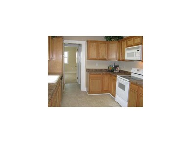 Kitchen. New oak kitchen with stove, microwave, re