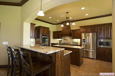 The eating bar in the kitchen is separate from the