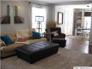 Large living flows to dining room.