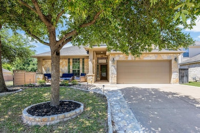 View of front of property featuring driveway, sto