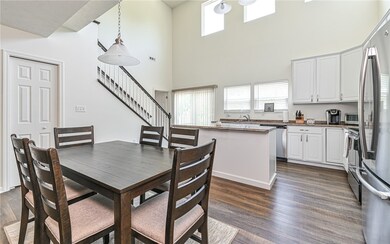 Light and bright kitchen boasts plenty of windows