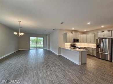 Kitchen with appliances with stainless steel finis