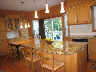 Eat in kitchen with granite counter tops and built