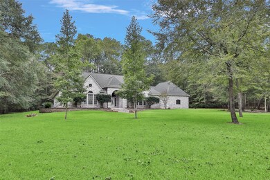 A view of the front of the house. Spacious house is located on 4.21+/- acres.