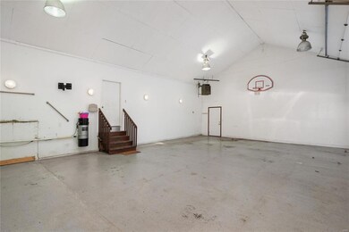 Truly amazing oversized 4 car vaulted ceiling gara