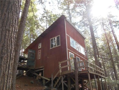 Rear of camp facing the lake w lots...