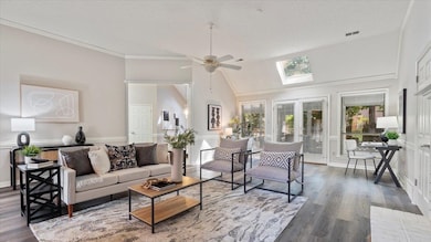 Living room with plenty of natural light, wood-typ