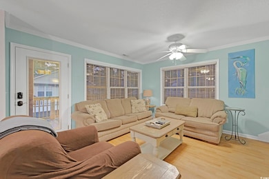 Living room featuring light hardwood / wood-style 