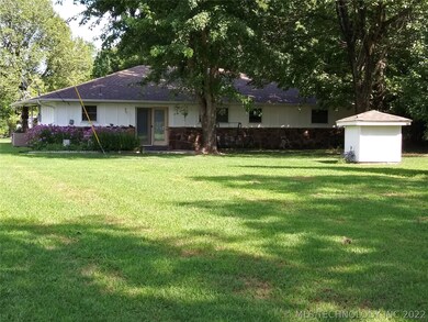 Back of House and well (property is Rural Water)