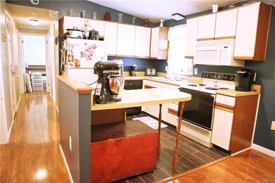 Open kitchen lay out keeps you part of the activit