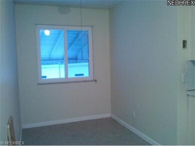 Dining area of kitchen complete with new window ov