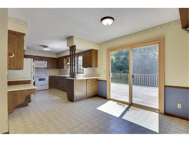Convenient  sliding glass doors off of the eat-in 