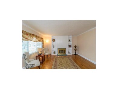 Beautiful hardwoods, fresh paint, fireplace!