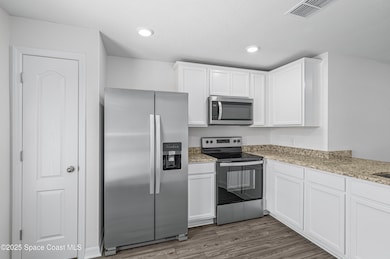 1155 Saturn St SE, Palm Bay, FL 32909 - photo 5