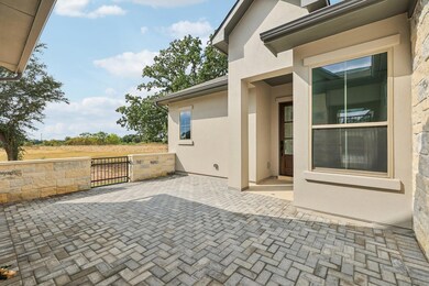View of patio / terrace featuring a gate