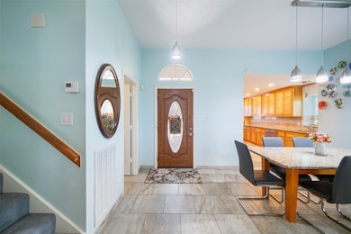 A beautifully designed wood front door with etched