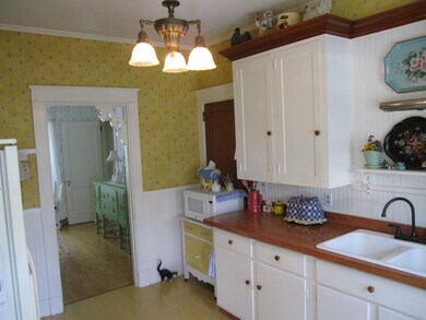 Kitchen is right off the Dining Room...