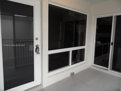 Unit entrance with high impact windows and doors