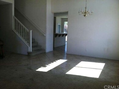 Formal Living/Dining ~ Stairs to upstairs loft.
