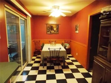 Kitchen/Dining combo - sliding door leads to the c