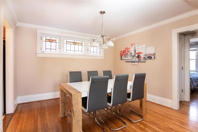 Dining Room Features Crown Molding, Stained Glass 