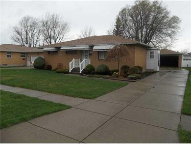 Exterior Front. Concrete driveway.