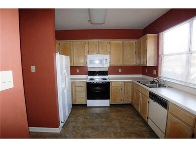 Bright Kitchen with new kitchen floor, range/oven,