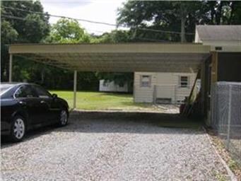 A two-car attached carport to protect your car fro