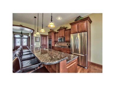 Kitchen. GRANITE COUNTERS AND GAS COOKTOP DOUBLE O