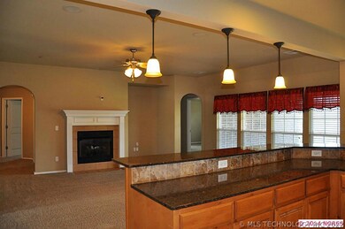 Granite Counters & Tumbled Marble Backsplash.