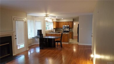 Kitchen and eat-in dining area opens to Family Roo