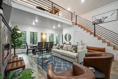 Living room with hardwood / wood-style floors