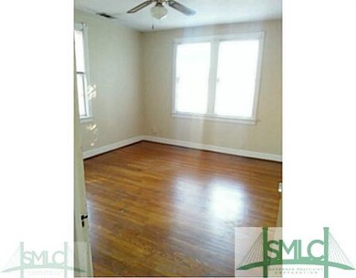 Bedroom. Multiple windows on exterior walls afford