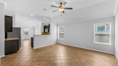 Fresh neutral paint welcomes you as you enter the living room
