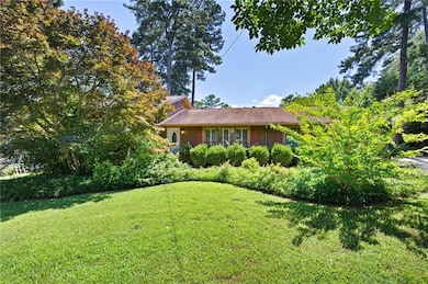 View of front of property with a front lawn